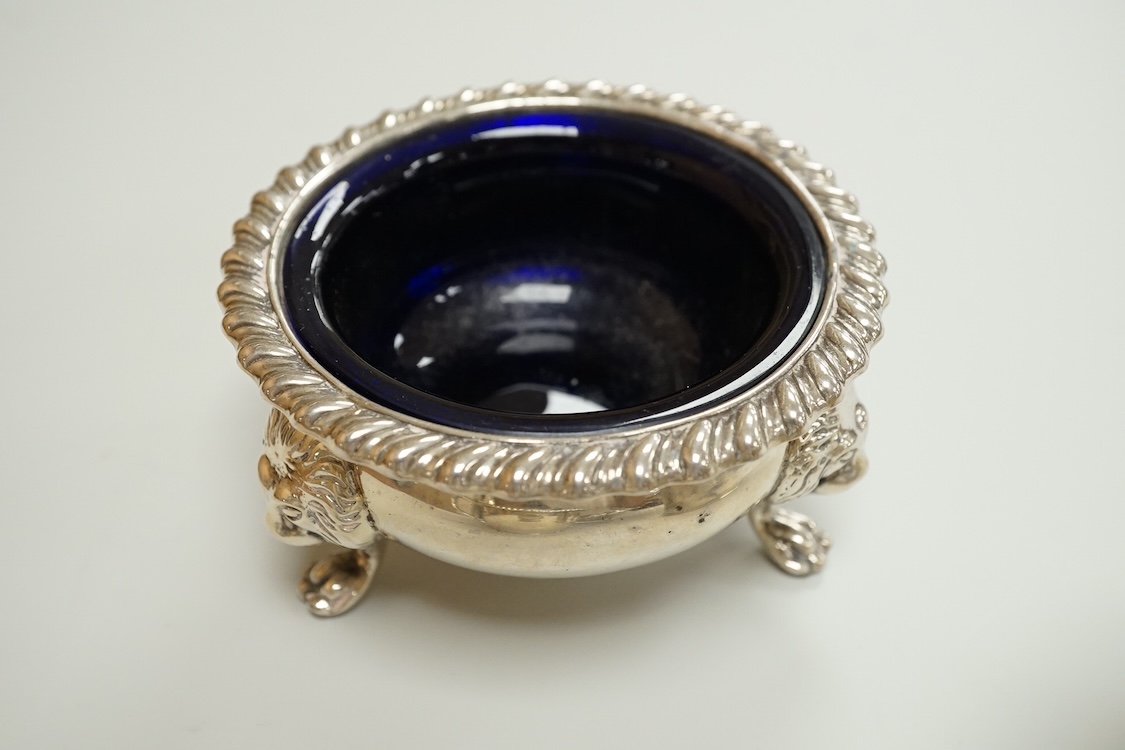 A Victorian silver drum mustard pot, a pair of later silver mustard pots and two silver salts including Victorian.